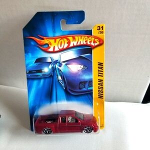 2006 Red Nissan Titan 1:64 Scale Diecast Hot Wheel Toy Truck New